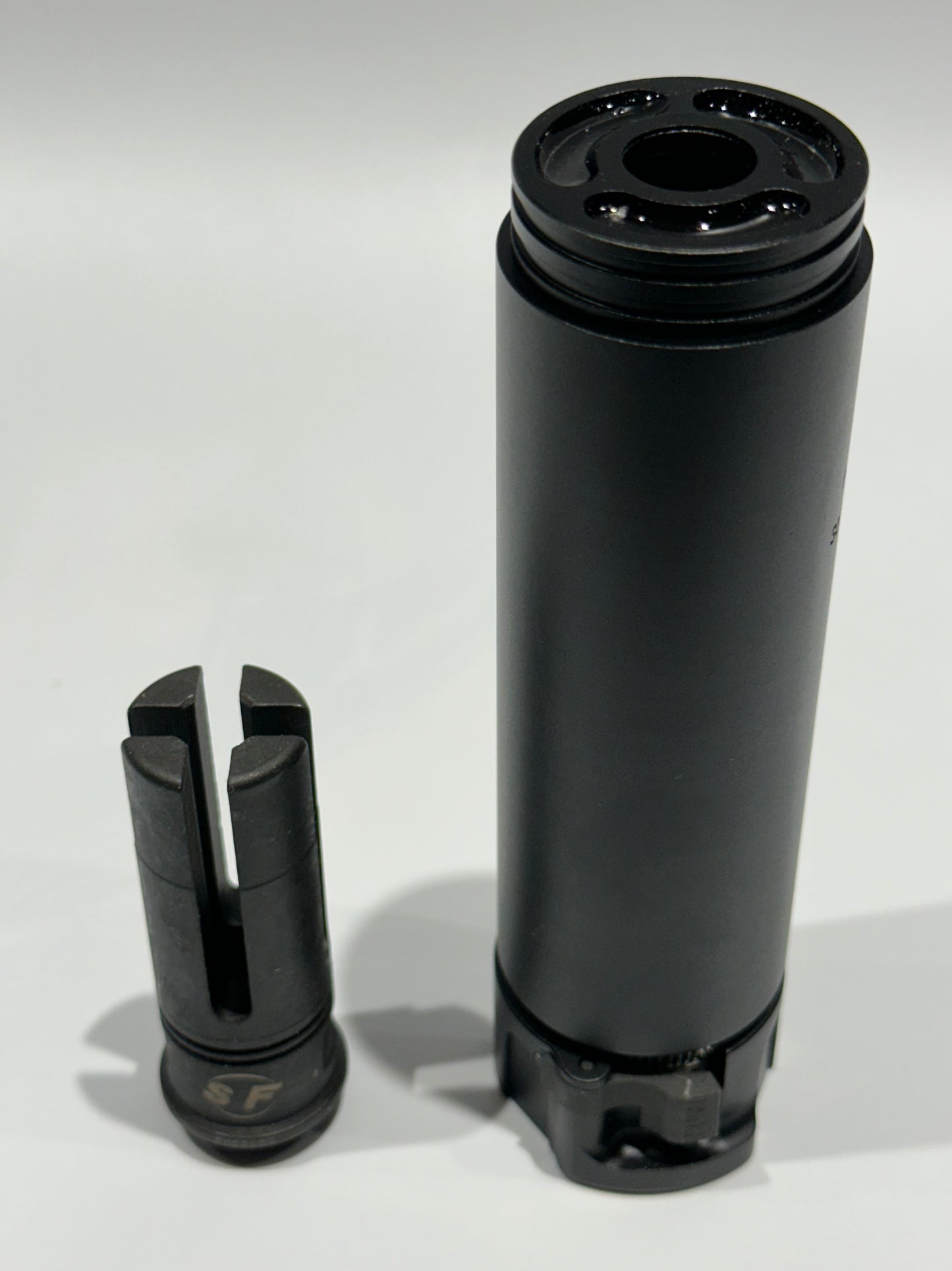 Suppressor with muzzle flash unit.