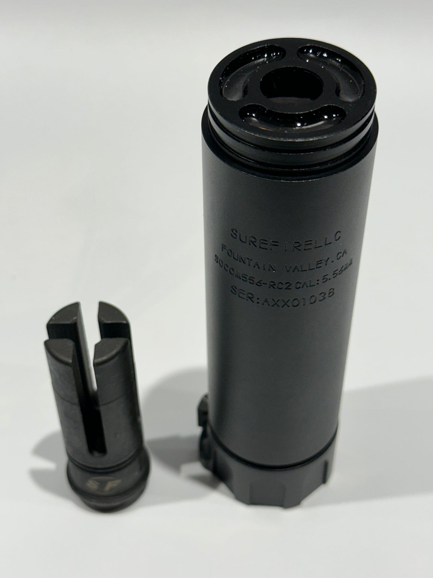 Suppressor with muzzle flash unit.